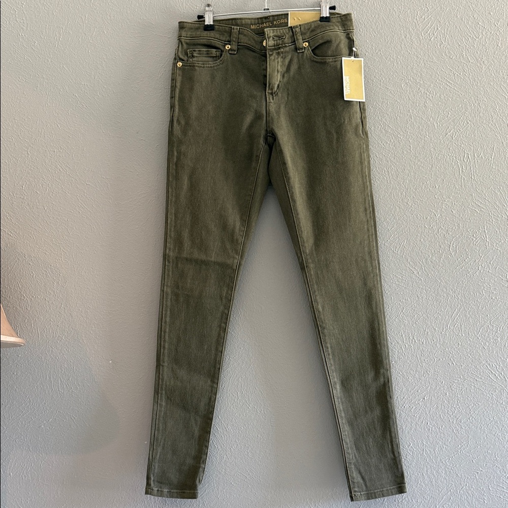 MICHAEL Michael Kors Skinny -Mid rise olive jean. Waist 14”. Rise 9”. Inseam 30”